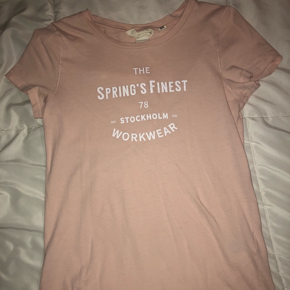 Pink t-shirt.